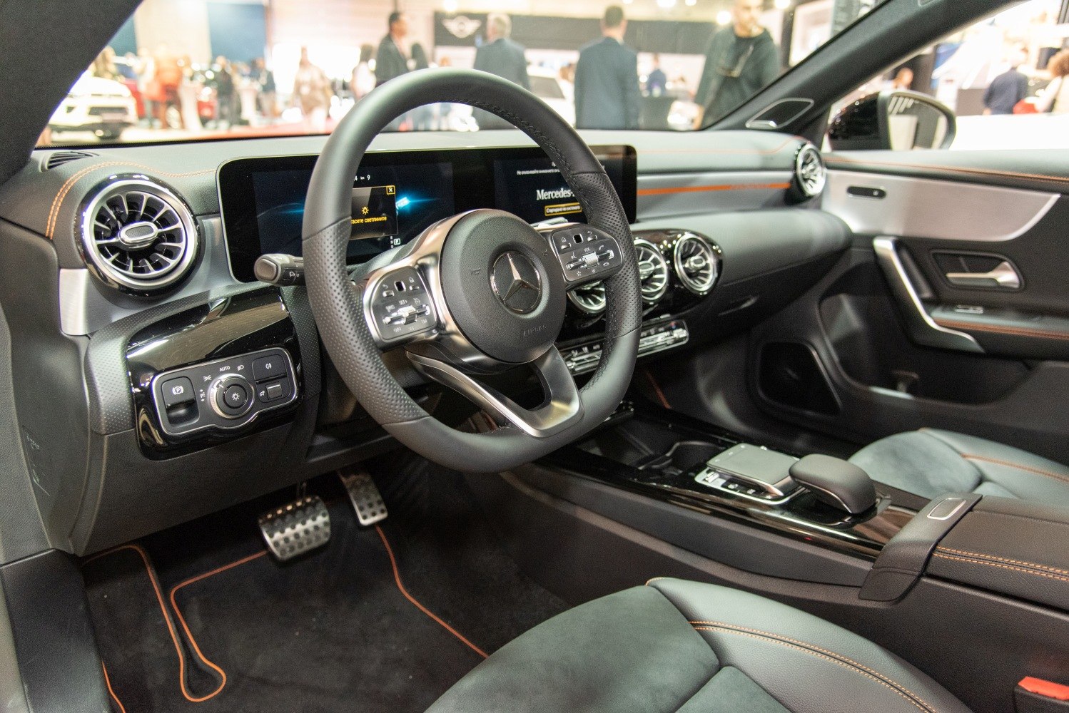 Multi-function steering wheel with digital dashboard and circular air vents