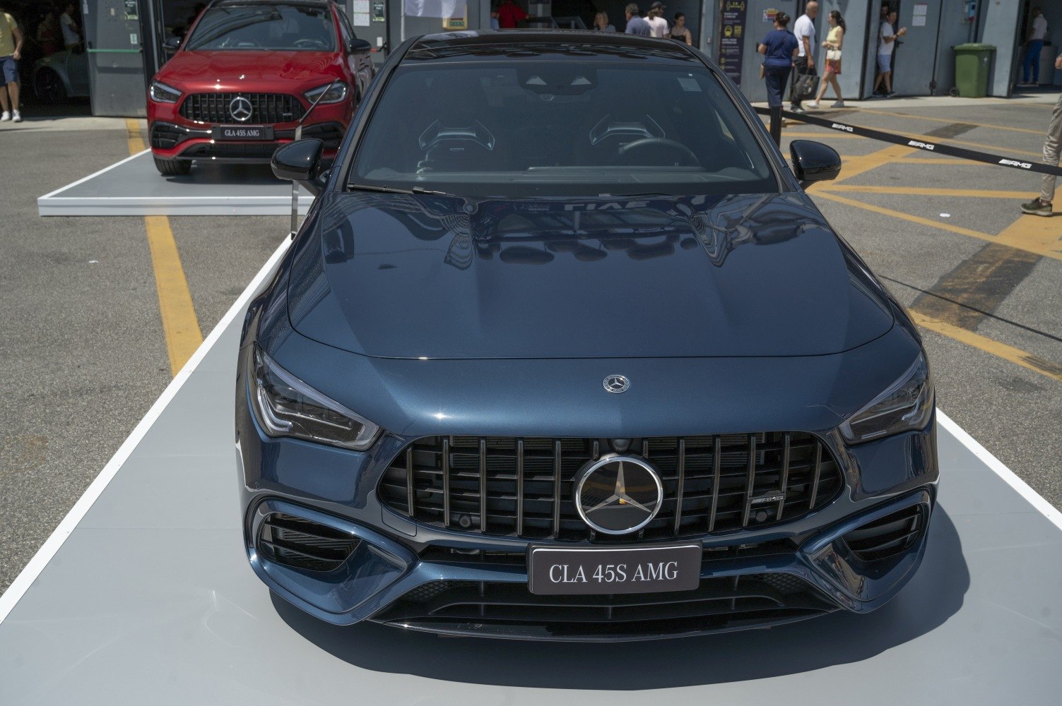 Aggressive AMG grille and sleek headlights of a modern performance coupe