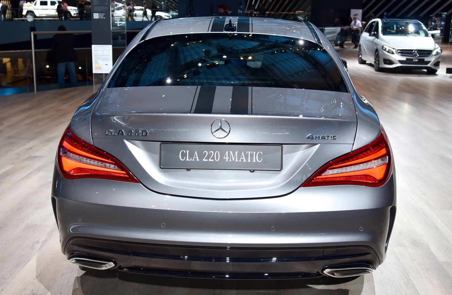 Rear view showcasing sleek taillights and dual exhaust outlets