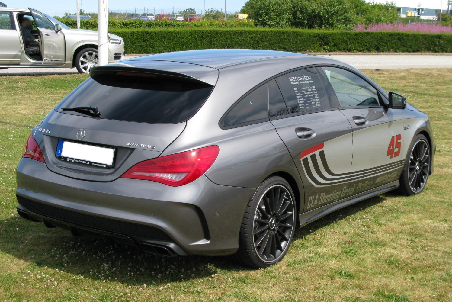 Sporty rear and side view with AMG 45 decals and alloy wheels