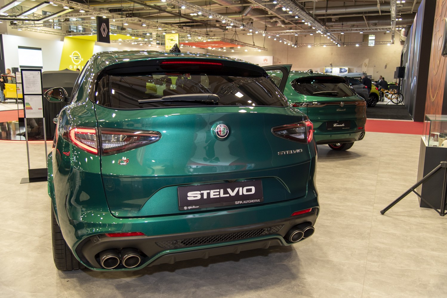 Rear view of SUV with quad exhaust and LED taillights