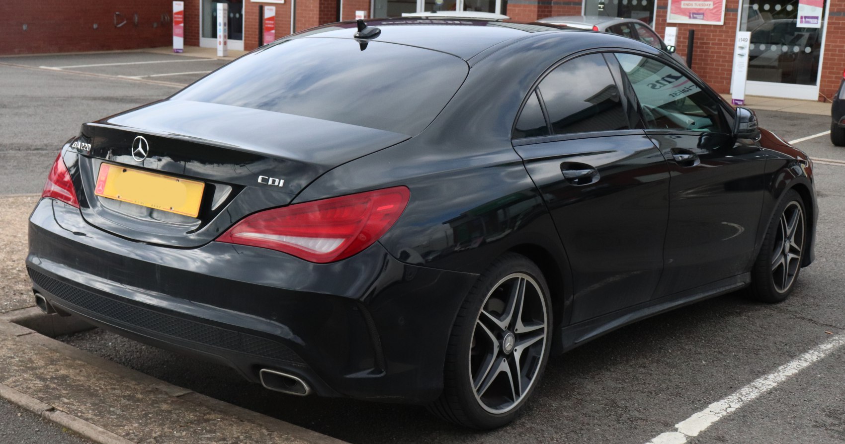 Rear view with sleek taillights and dual exhaust outlets
