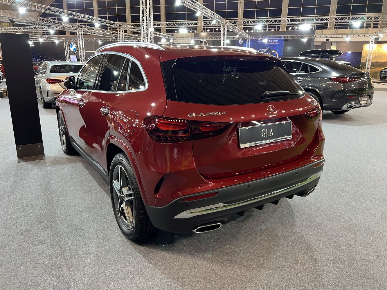 Rear view with modern LED taillights and dual exhaust tips.