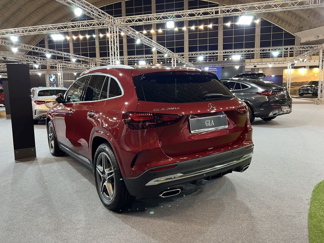 Rear design with dual exhaust and LED tail lights of a modern luxury compact SUV