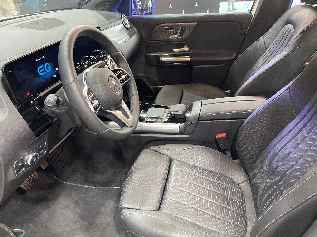Luxury car interior with digital dashboard and leather seats
