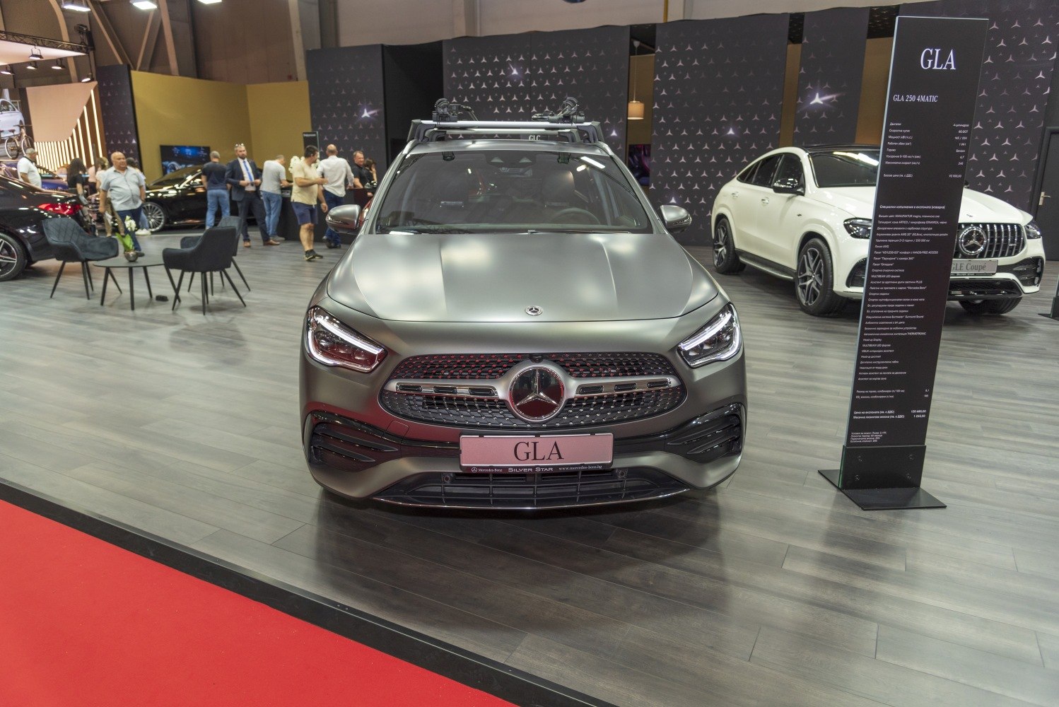 Front grille and headlights of luxury SUV with roof rack