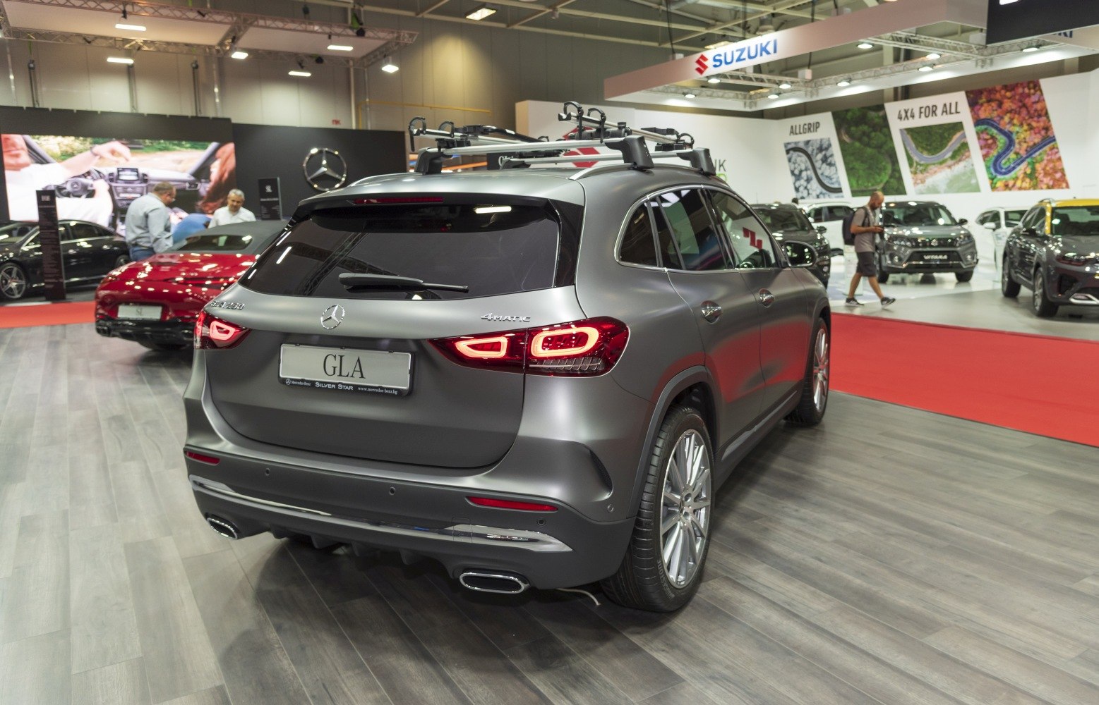 Rear view of compact SUV with roof rack and LED taillights