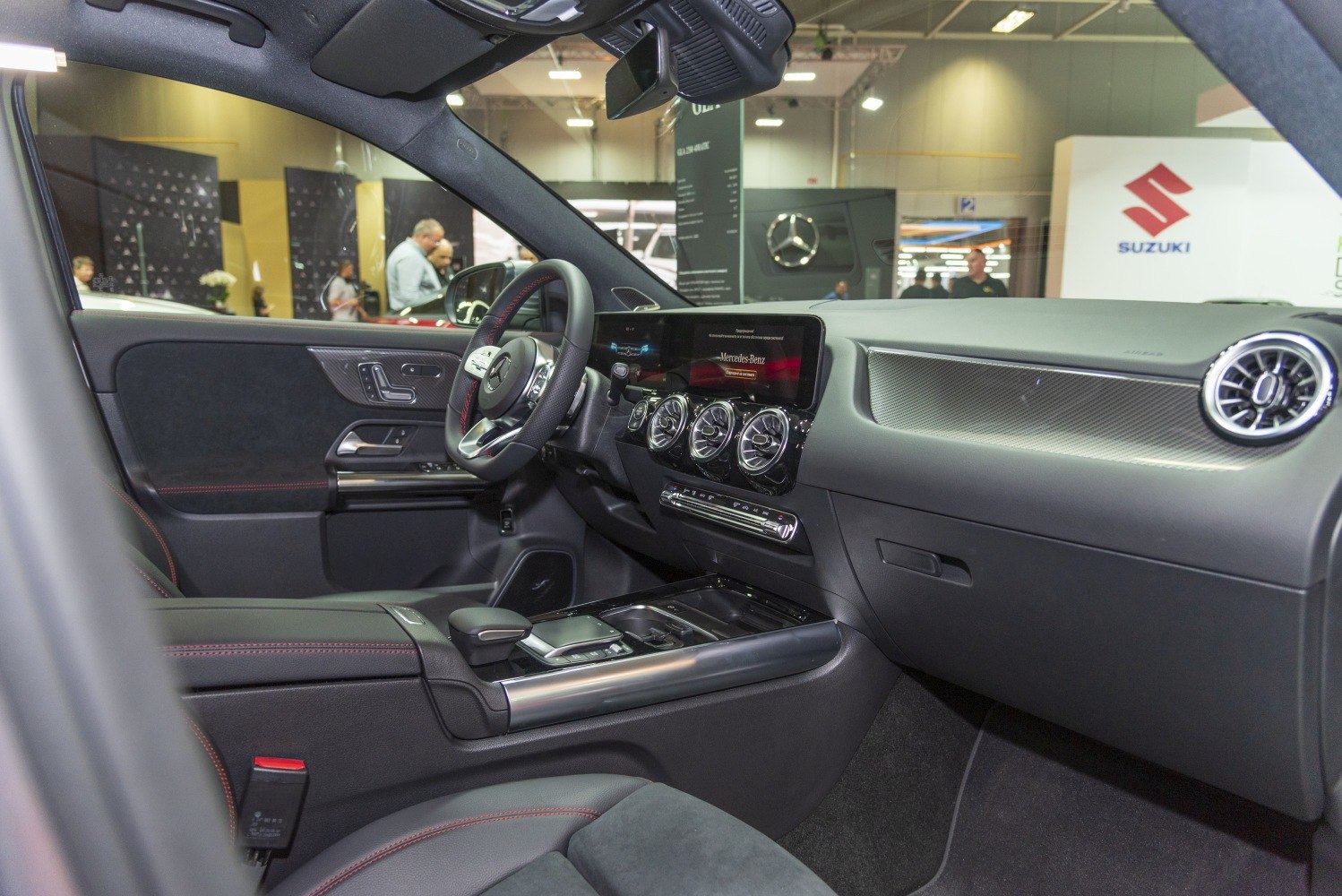 Modern luxury interior with digital displays and distinctive turbine-style air vents