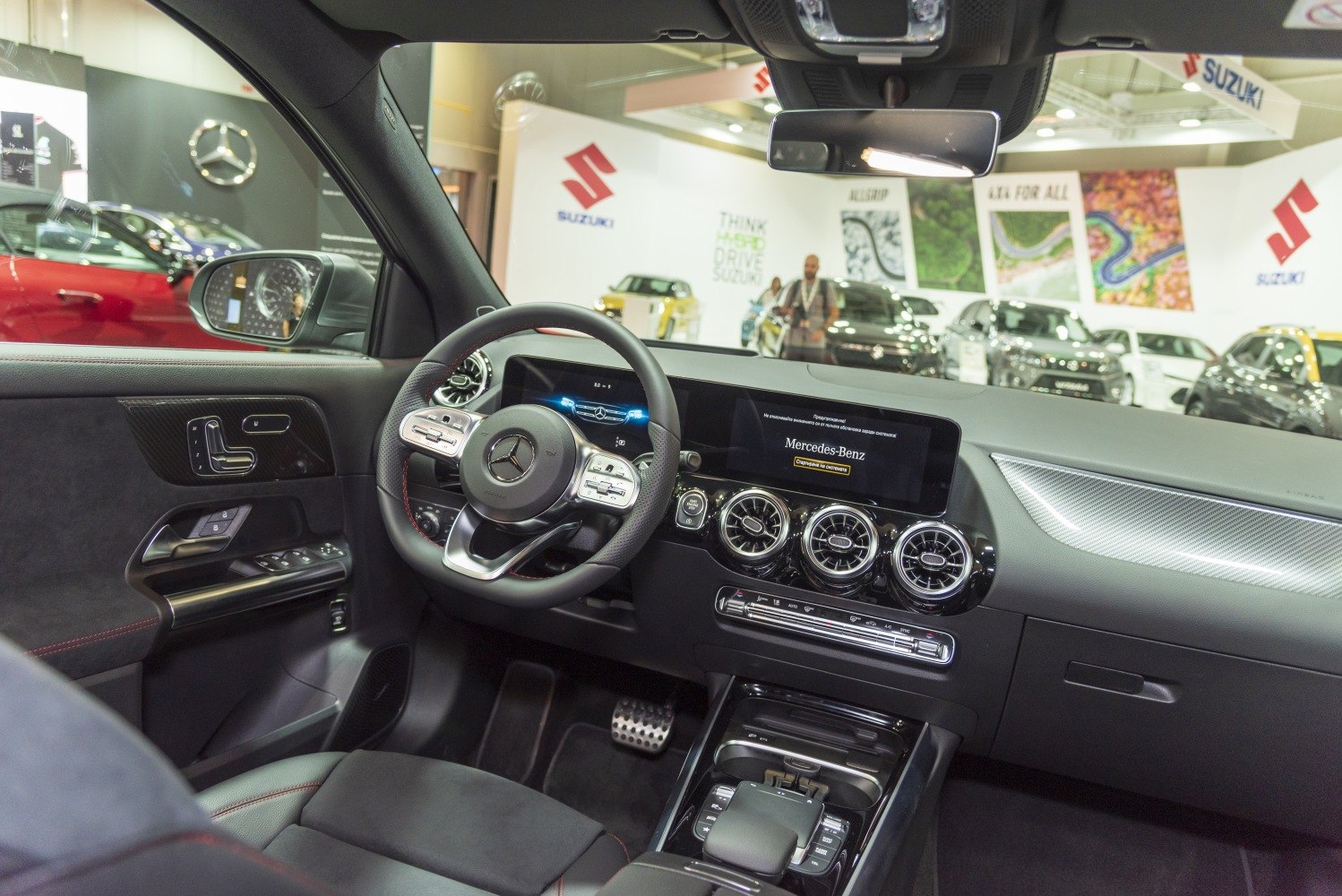Modern digital dashboard and multifunction steering wheel with circular air vents