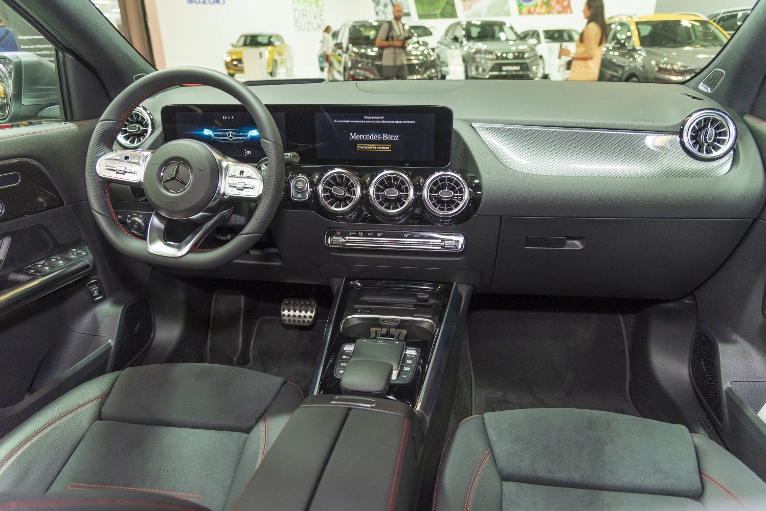 Digital dashboard and round air vents in luxury car interior