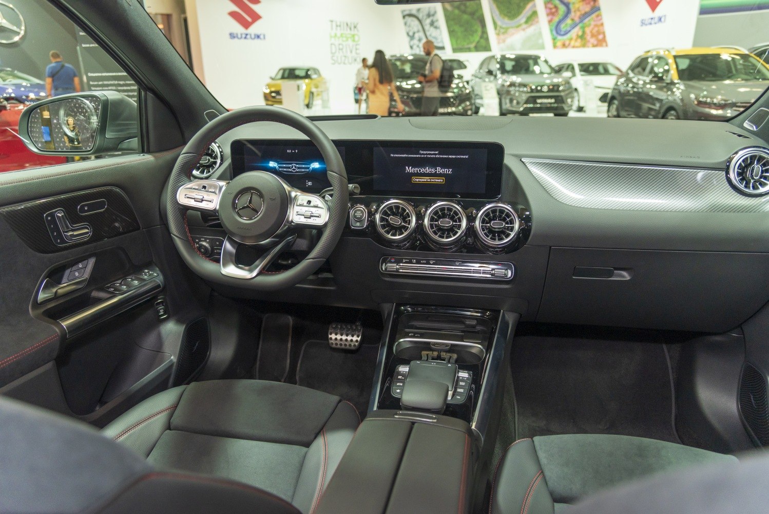 Digital dashboard and sporty steering wheel with turbine-style air vents