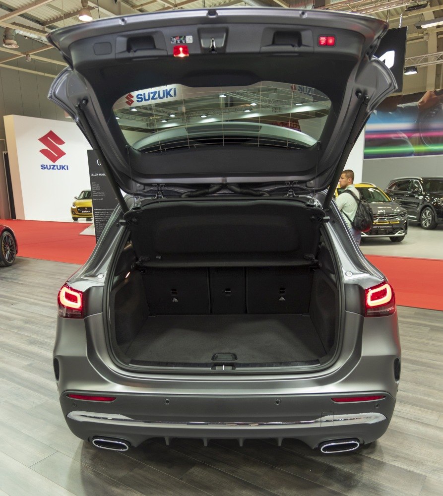 Rear trunk space with open hatchback and modern tail lights