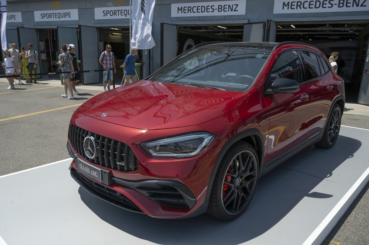 Sporty front grille and alloy wheel design with red body.