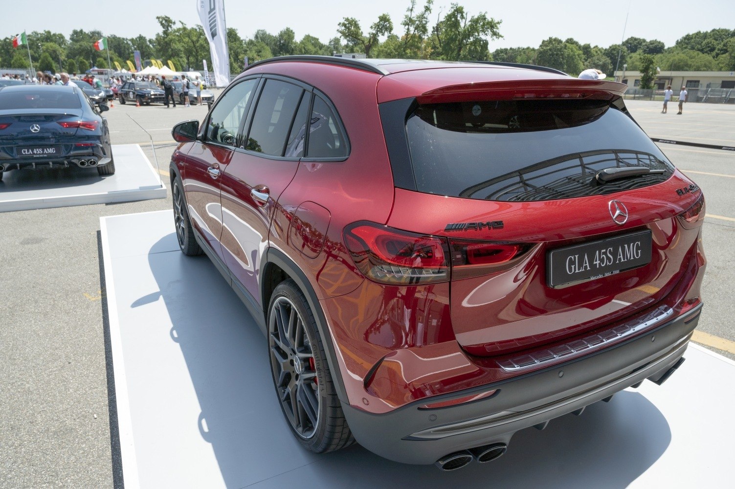 Rear view of sporty SUV with quad exhausts and sleek taillights
