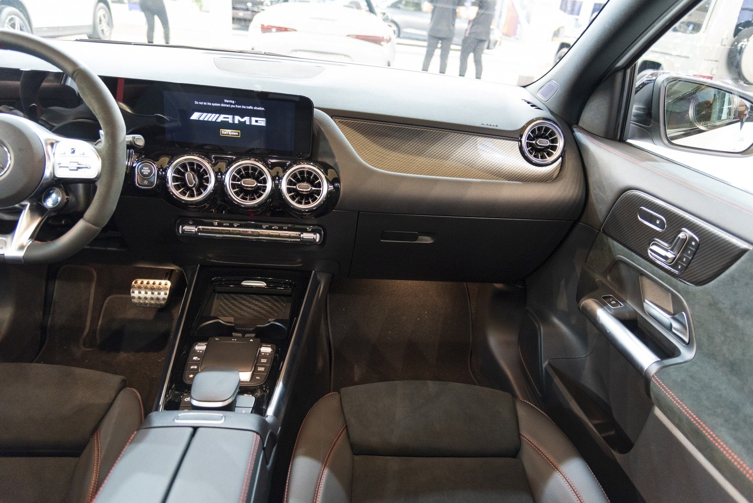 AMG digital display with circular air vents and modern center console controls