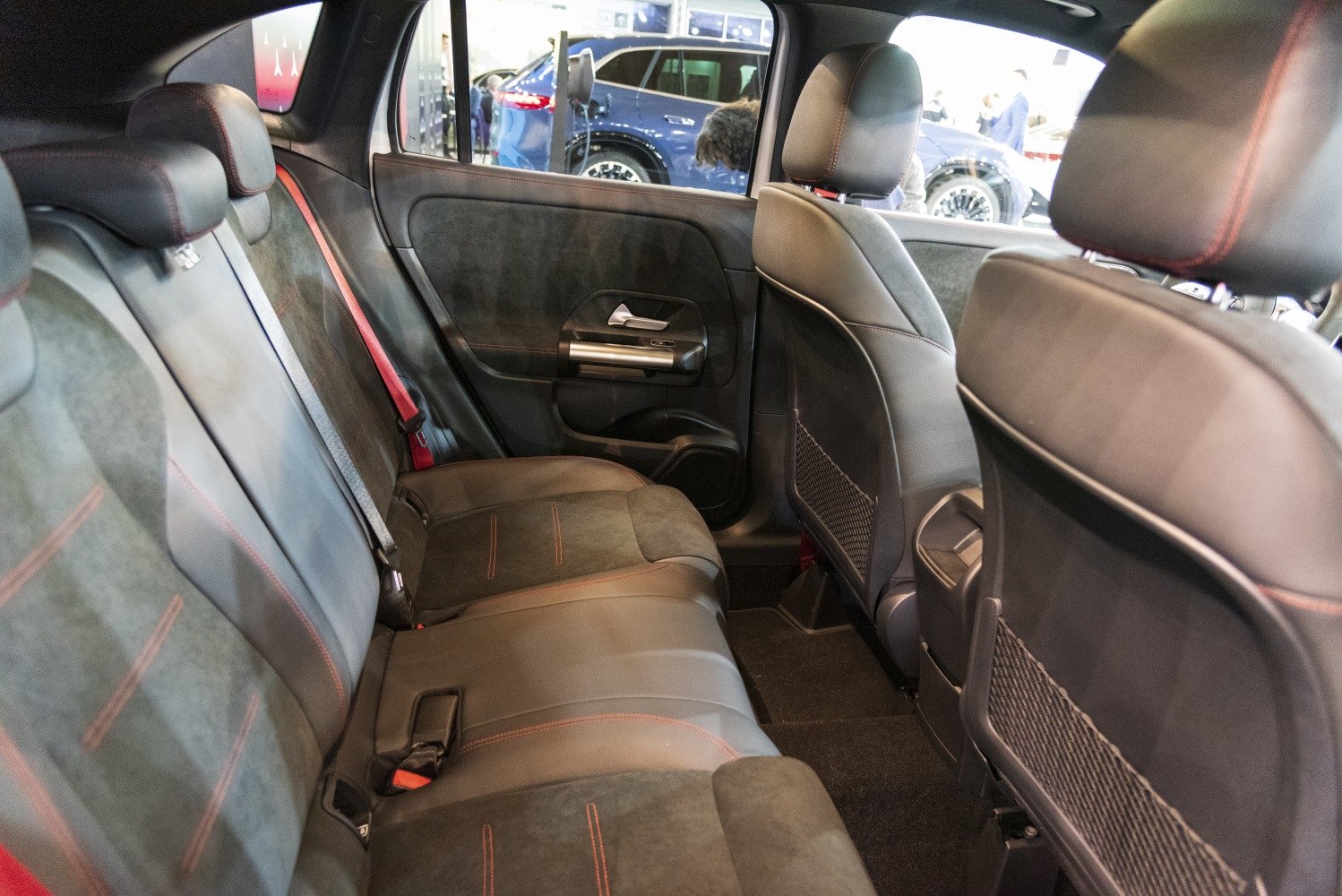 Rear seats with leather and Alcantara upholstery, red contrast stitching