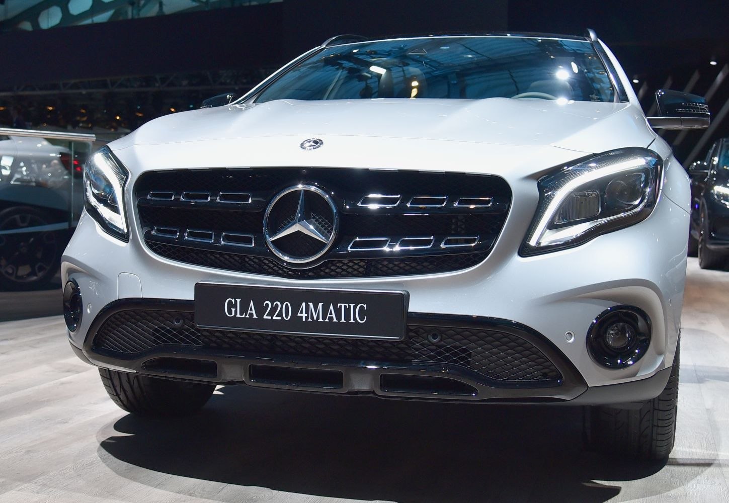 Close-up of front grille and LED headlights
