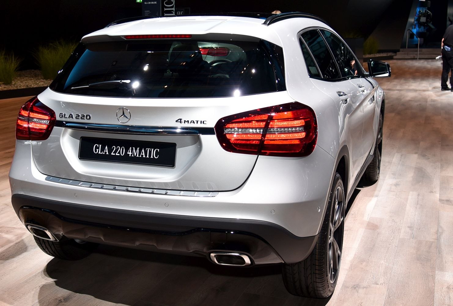 Rear view with prominent taillights and dual exhausts