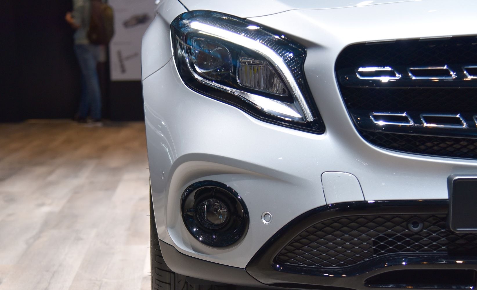 Front headlight and fog light with grille and bumper details