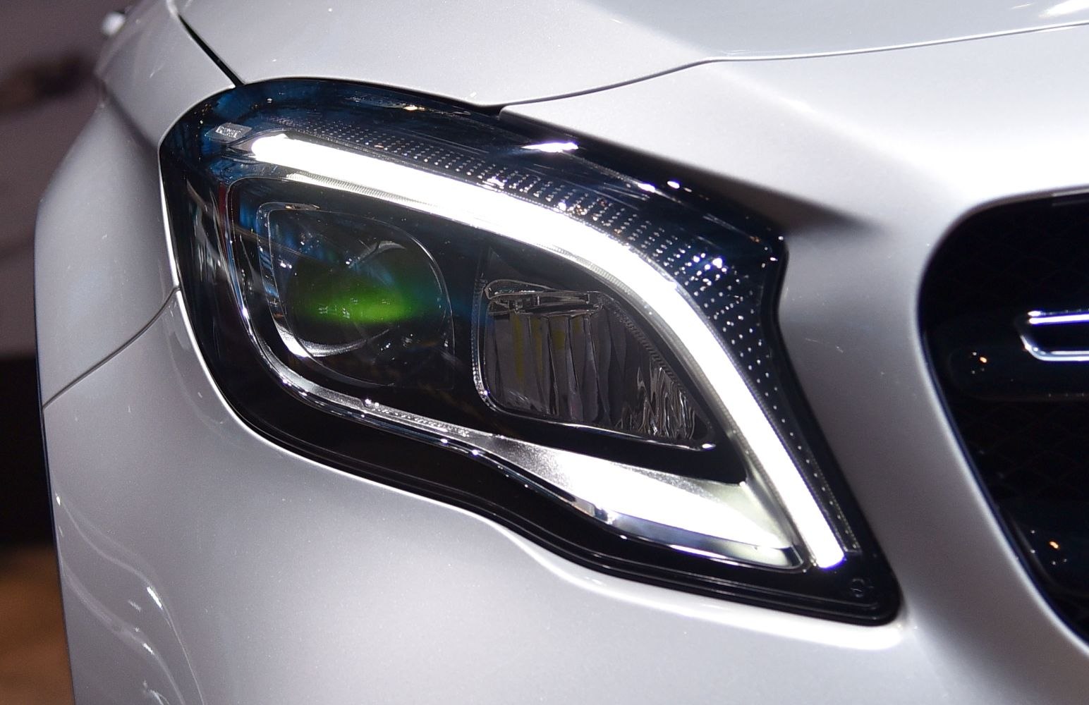 Close-up of detailed headlight with LED daytime running lights