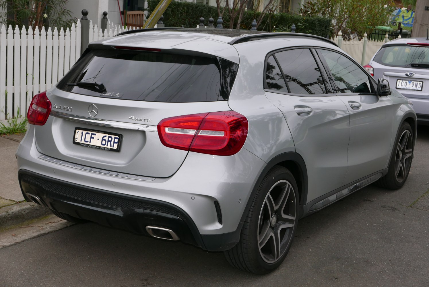 Compact SUV rear with dual rectangular exhausts and LED tail lights