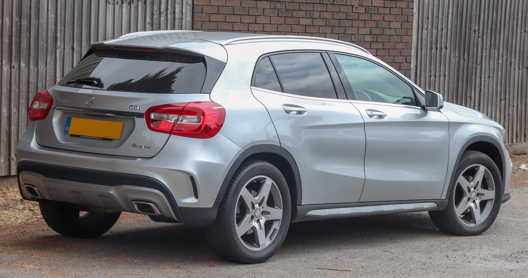 Silver compact SUV rear side view with alloy wheels and tinted windows