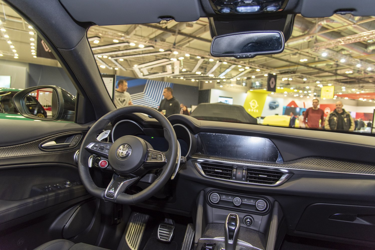 Interior with sporty multi-function steering wheel and modern dashboard design