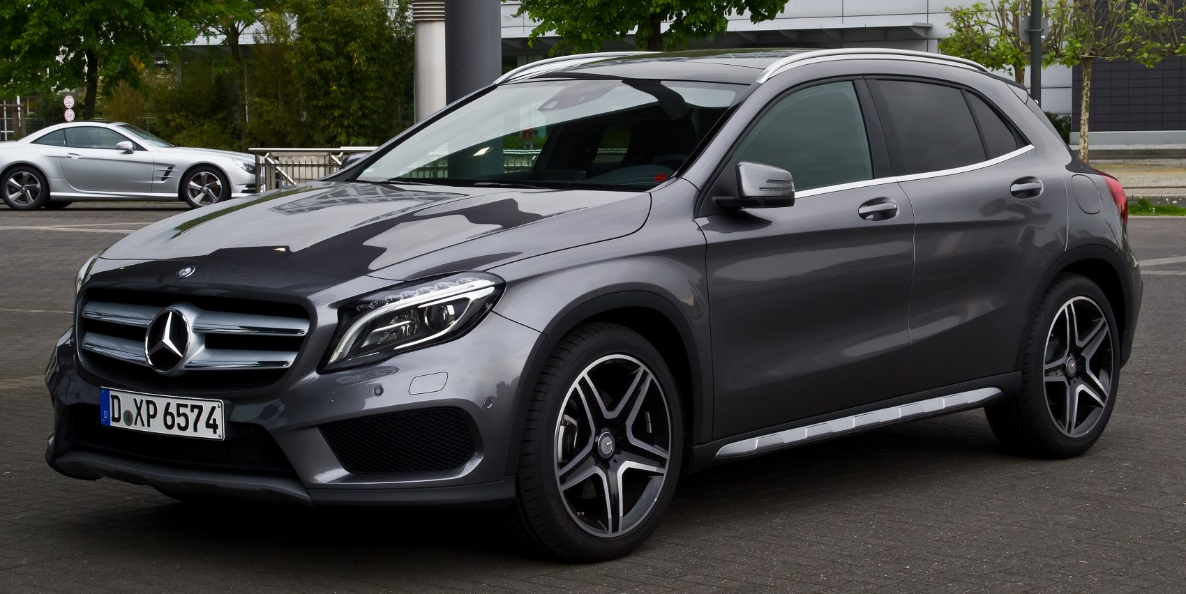 Front-side view with sleek headlights and alloy wheels