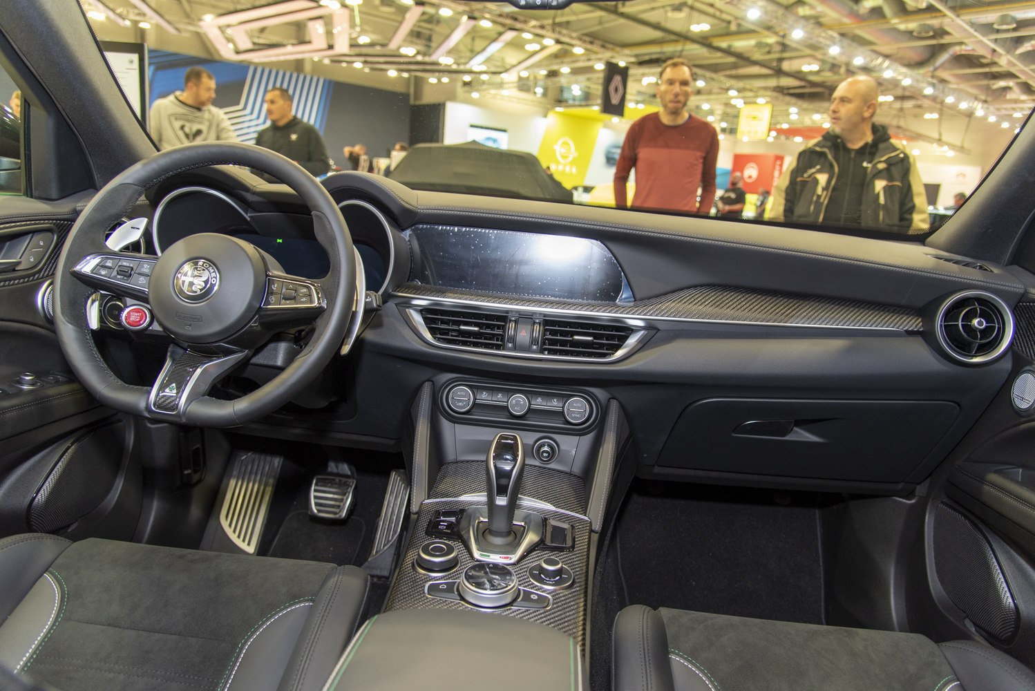 Dashboard and steering wheel with carbon fiber trim