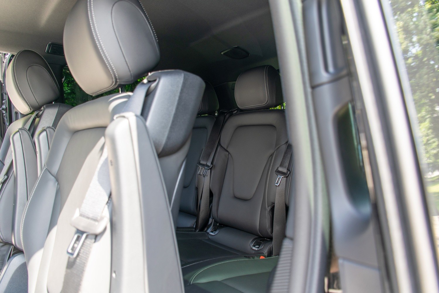 Spacious interior with leather seats and safety belts
