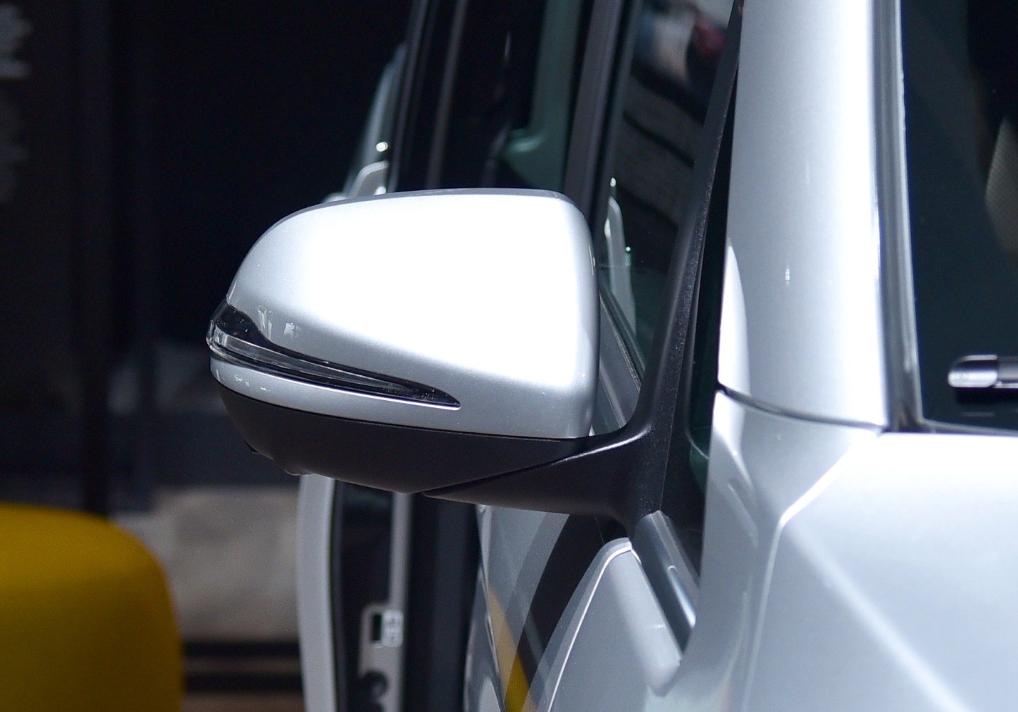 Silver side mirror with integrated turn signal