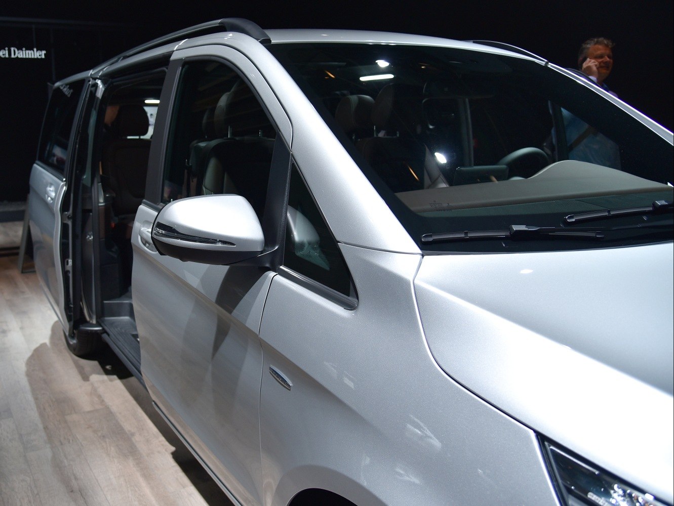 Sliding side door open with visible side mirror