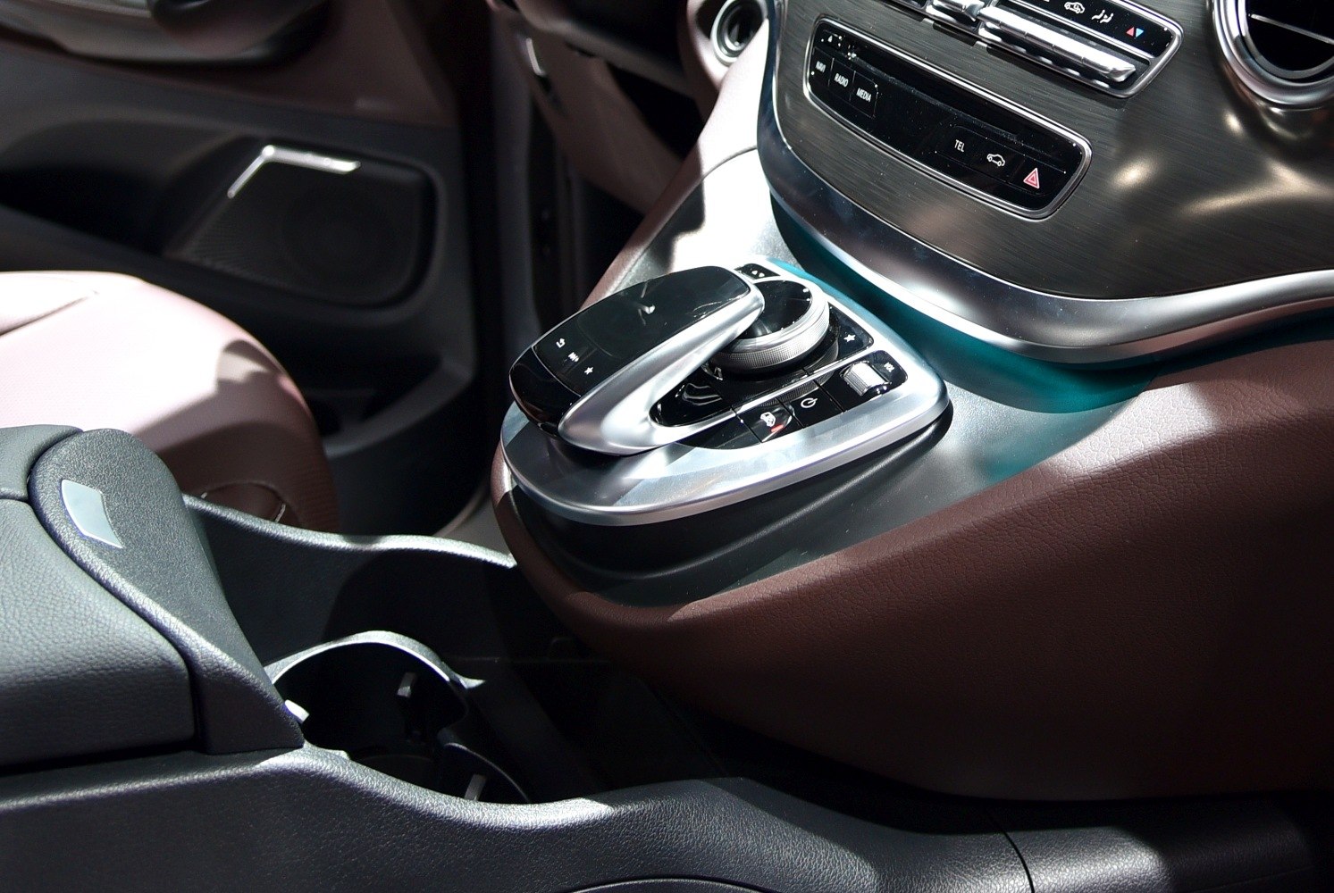 Multimedia control panel with wood trim and dashboard buttons