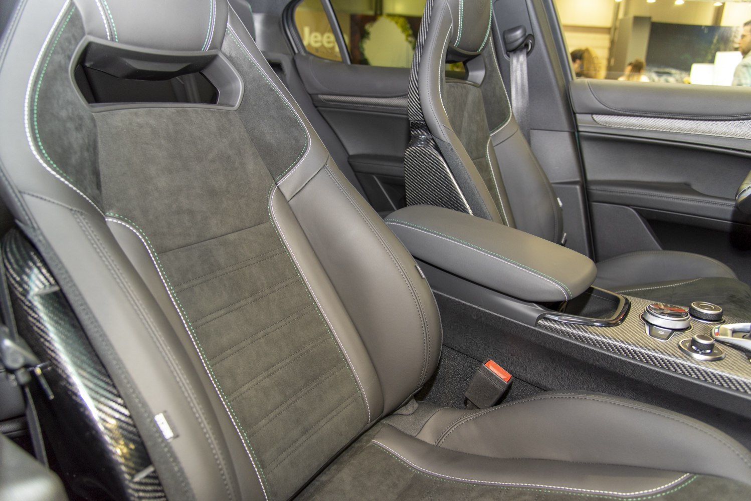 Sport seats with leather and Alcantara upholstery and carbon fiber trimming