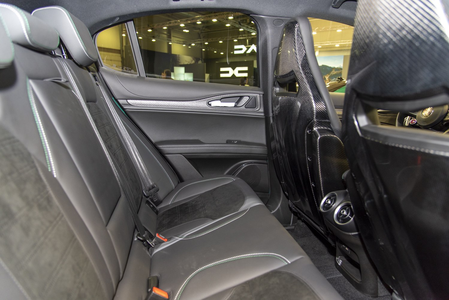 Rear seat area with leather and Alcantara upholstery plus carbon fiber front seat backrests