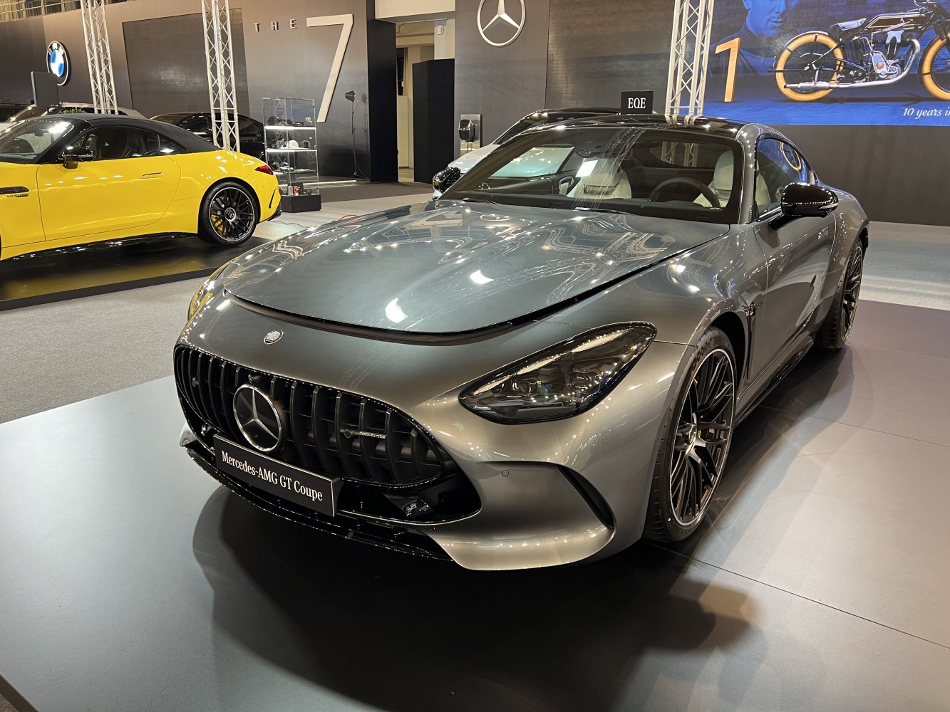 Front view with aggressive grille, sharp headlights and sporty wheels