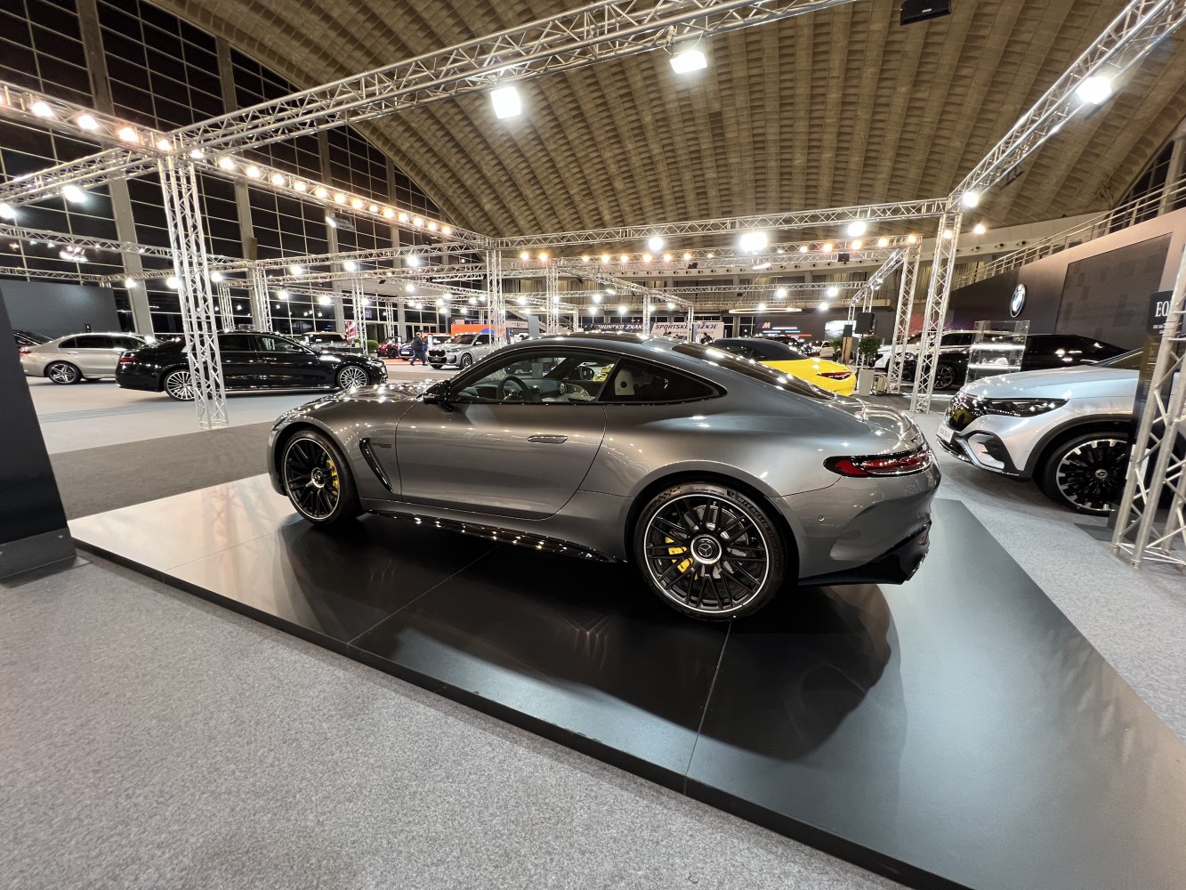 Sleek side profile with sporty alloy wheels and dynamic coupe shape.