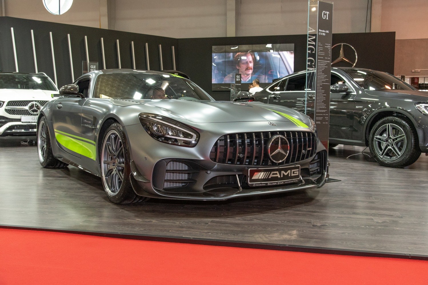 Front view with aggressive grille and sporty aerodynamic elements.