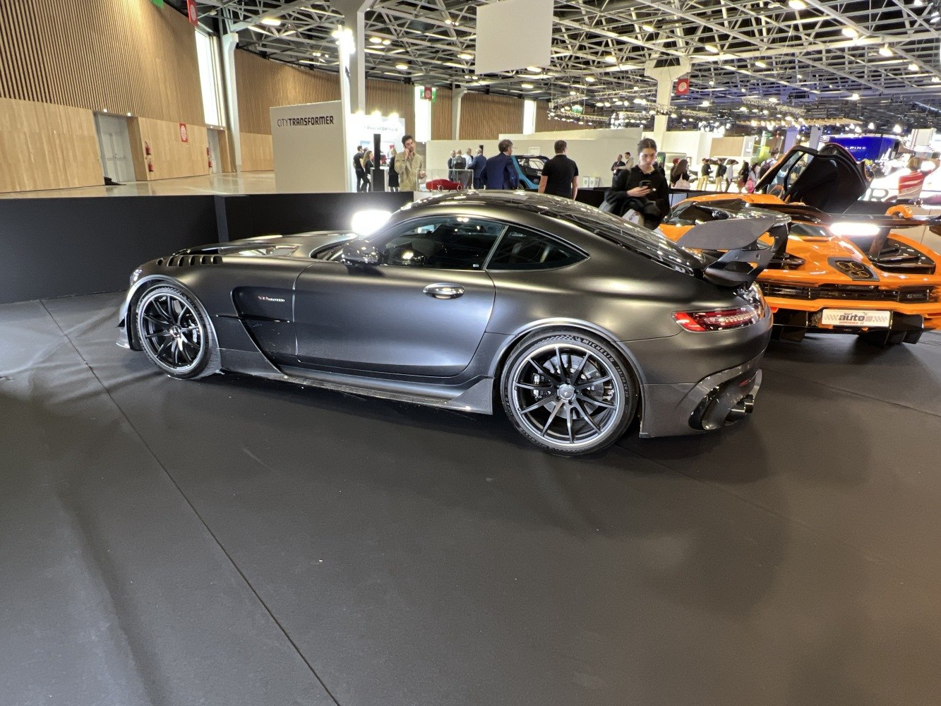 Side profile with aggressive rear wing and aerodynamic design