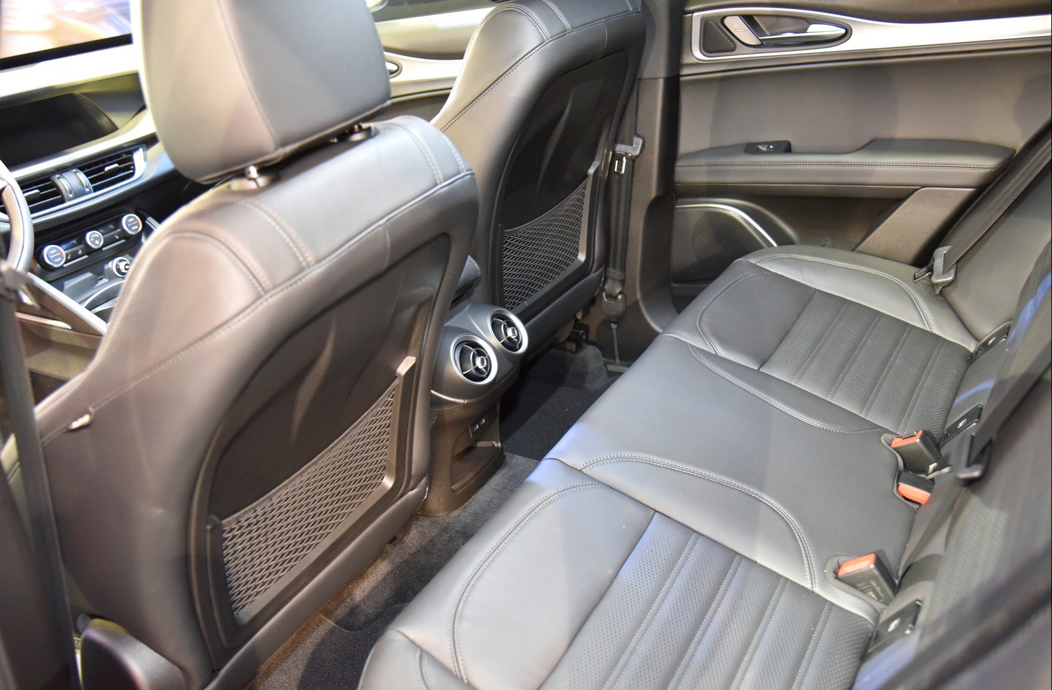 Rear seat leather upholstery and dual circular air vents