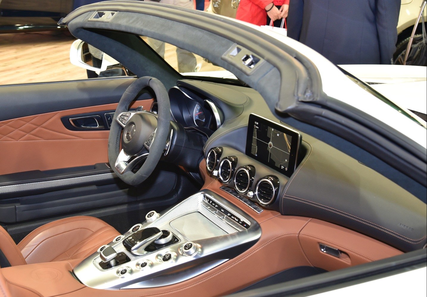 Luxury AMG GT Roadster interior with leather seats and advanced infotainment.