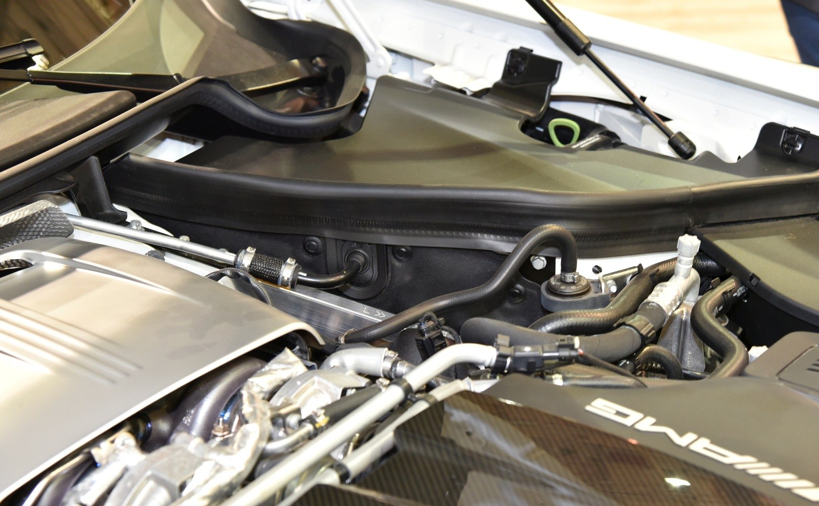 Engine compartment with AMG branding and mechanical components