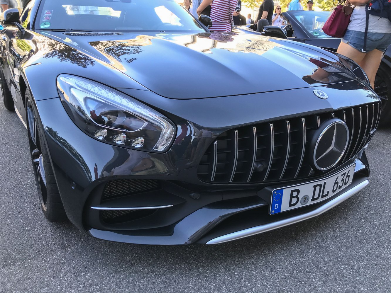 Front intake grille and LED headlight of a sports car