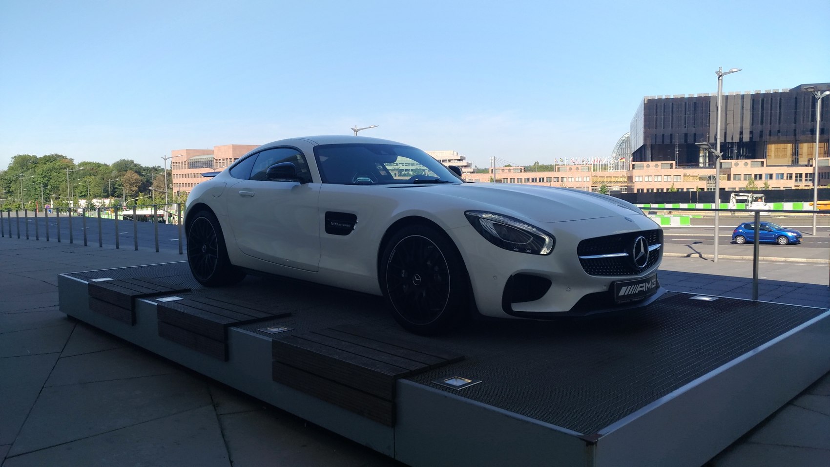 Front 3-quarter view of sleek luxury coupe with aerodynamic profile
