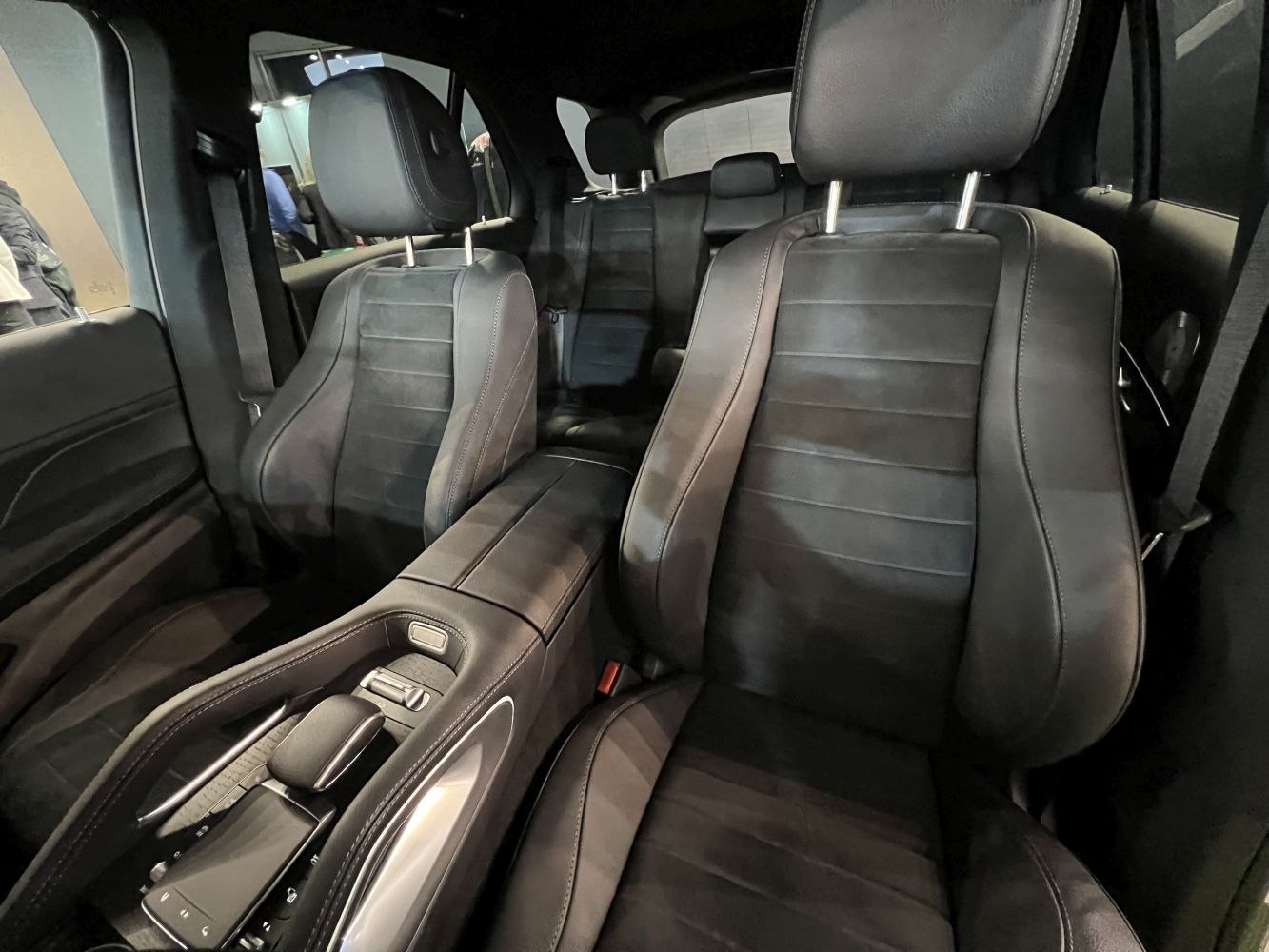 Luxurious black leather seats and modern central console interior