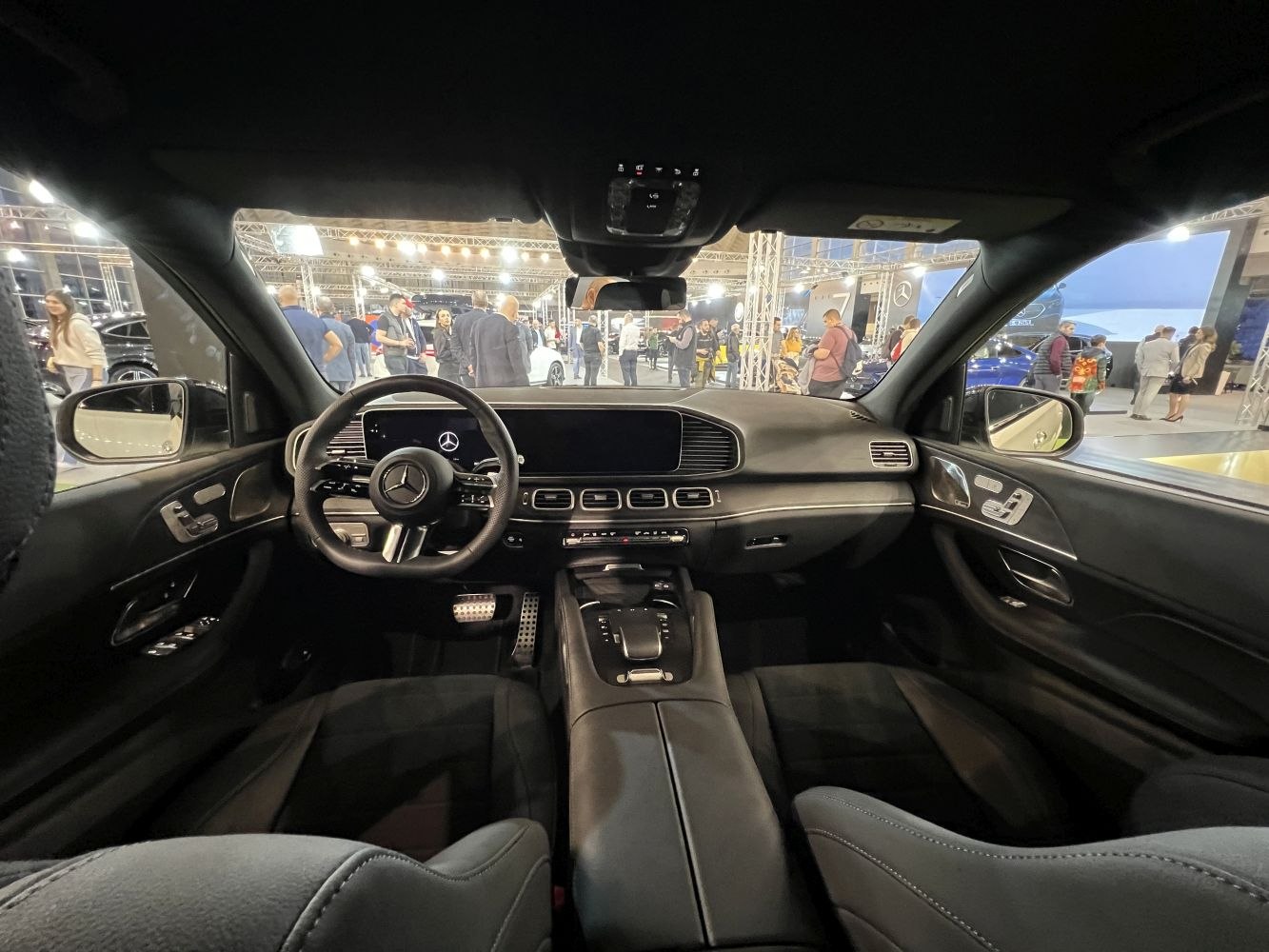 Modern luxury car interior with digital dashboard and multifunction steering wheel