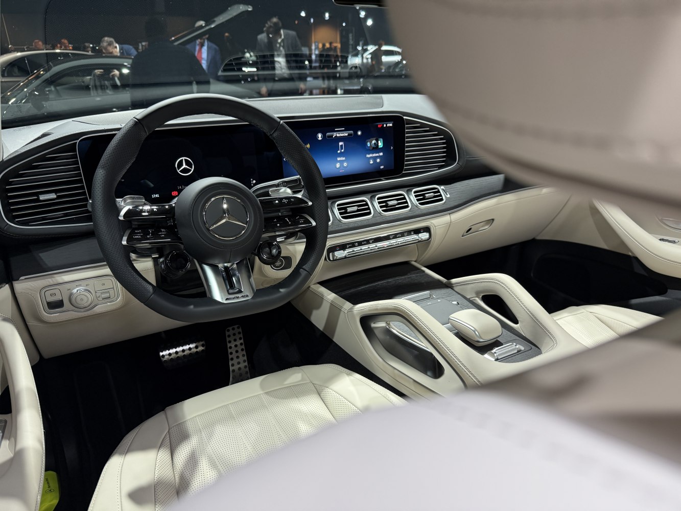 Luxury SUV interior with digital dashboard and advanced steering wheel controls