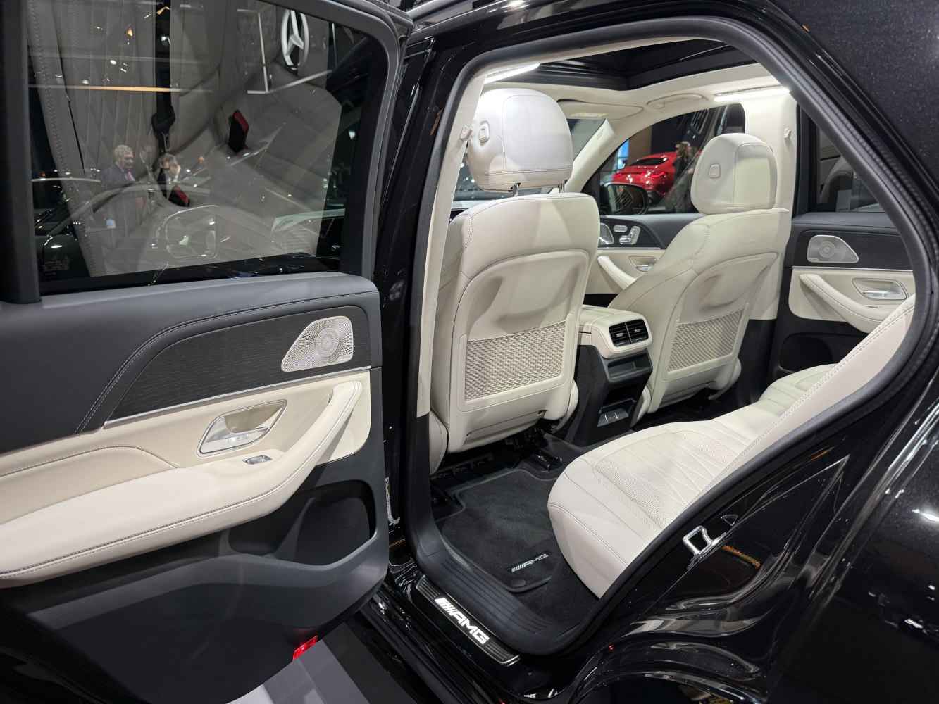 Luxury beige leather rear seats and AMG interior trim.