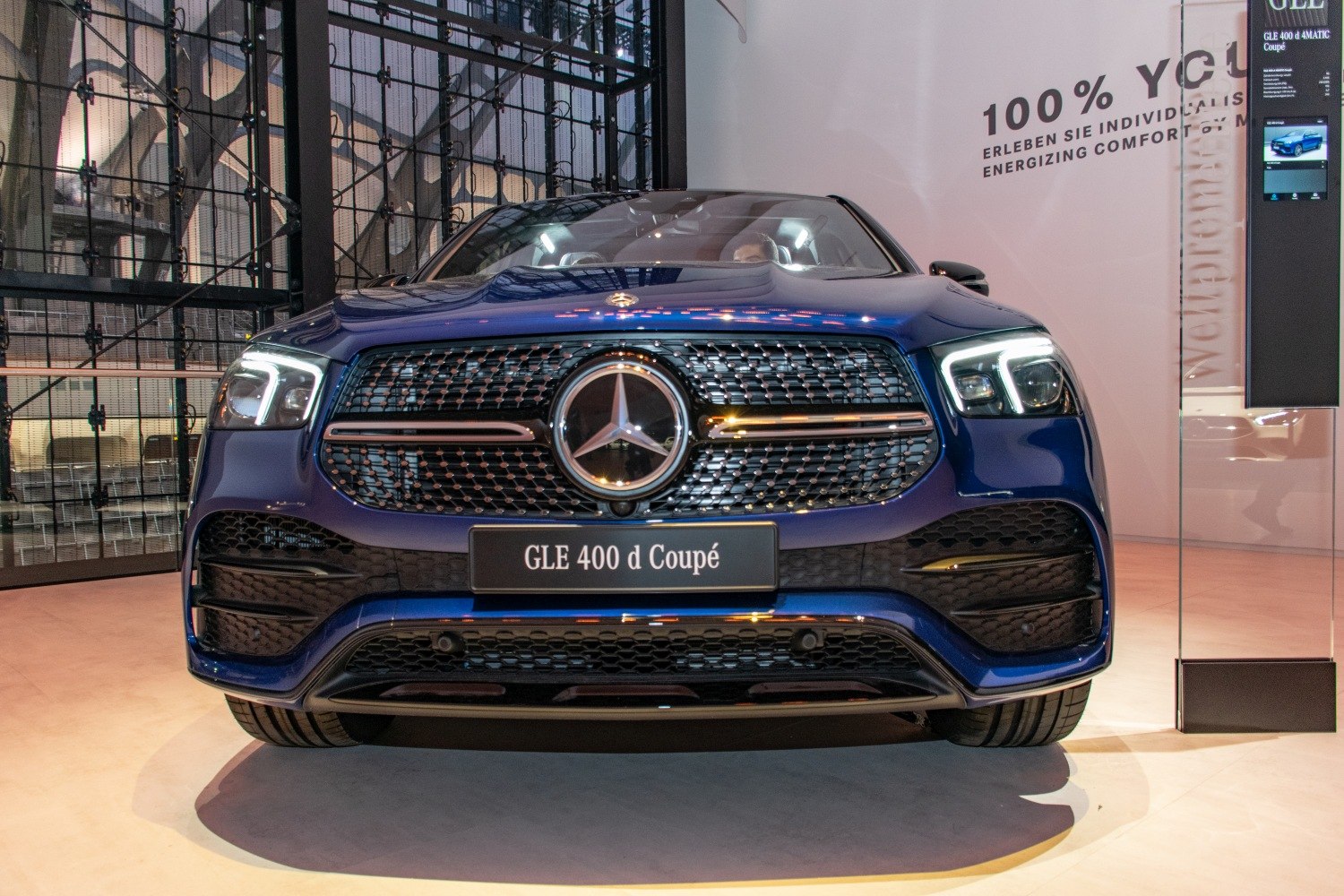 Front view with LED headlights and distinctive grille