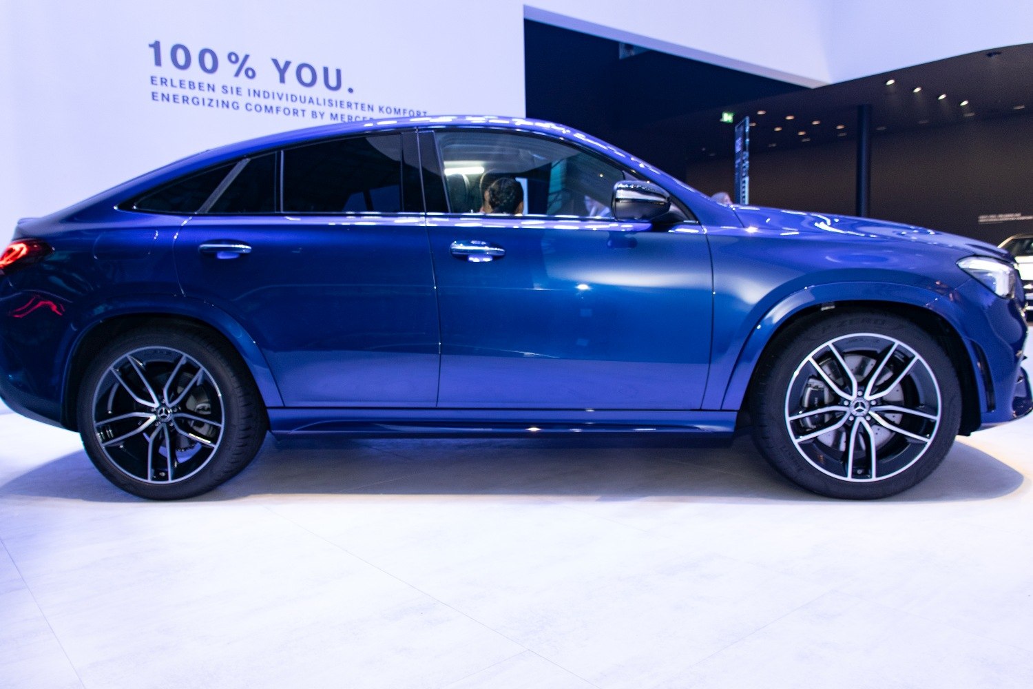 Sporty coupe SUV side profile with alloy wheels and streamlined roofline